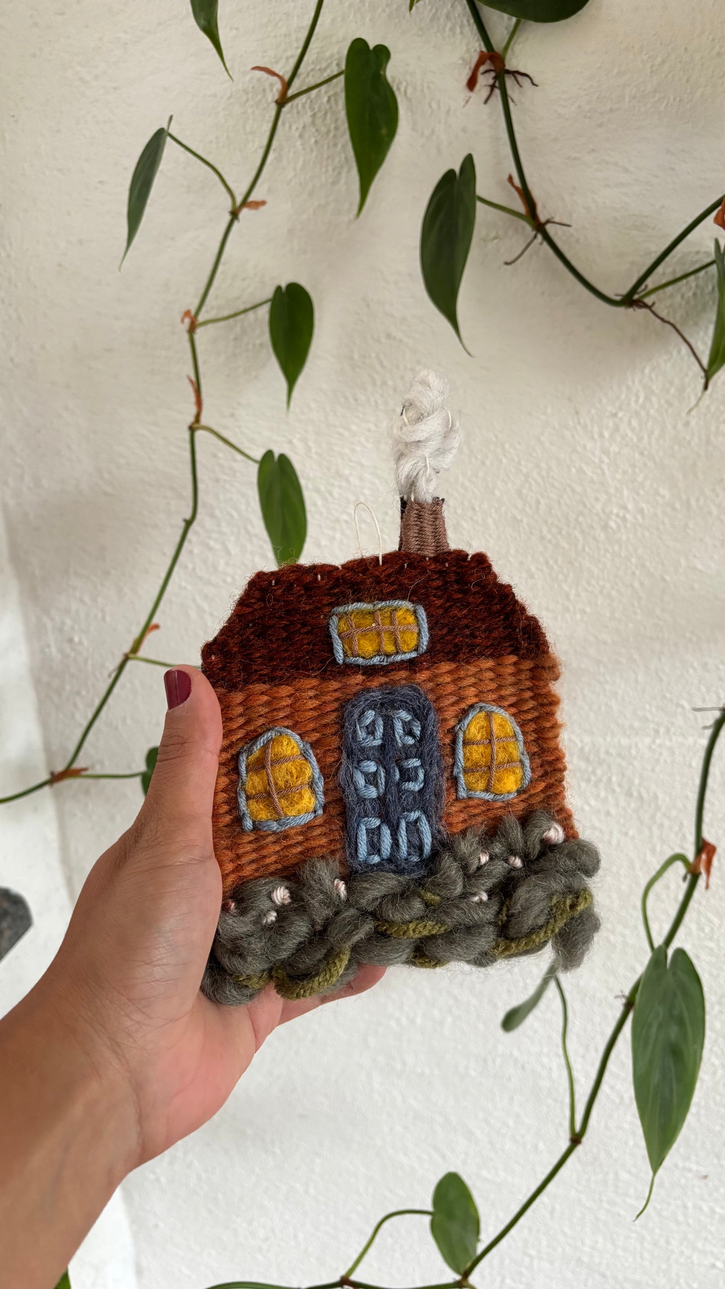 Orange cottage with blue door