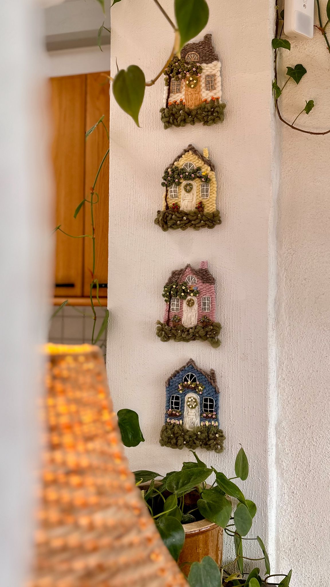 Yellow cottage with bird