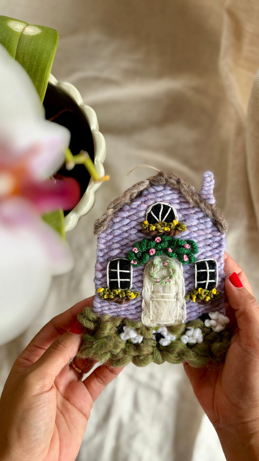 Lilac cottage with sheep