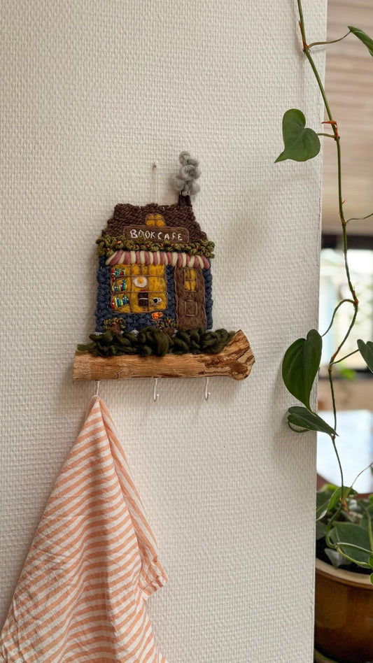 Book cafe wall holder